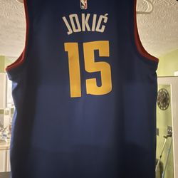 Nikola Jokic.  Mile High City Jeresy. Large Nike Jeresy.
