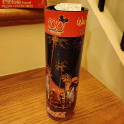 Disney 100 Years of Magic 8 oz Coca Cola Bottle in decorated tube

