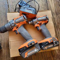 Ridgid 18V Brushless Cordless 3-Speed 1/4 in. Impact Driver and 18V Brushless Cordless 1/2 in. Hammer Drill/Driver combo.