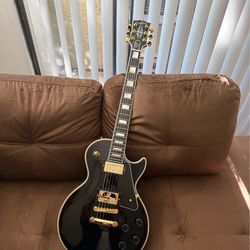 Epiphone Les Paul Custom “Inspired by Gibson Custom” – Ebony w/Gold Hardware (Brand New)
