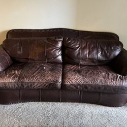 Well Loved Leather Couch