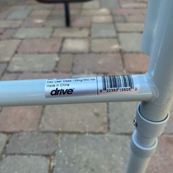 Porta potty. Adjustable height folds up for travel never used. New