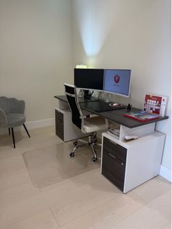 Desk and grey chair