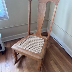 Antique caned rocking chair