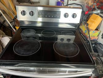 Samsung model # NE59M4310 Stainless Steel Glass Top Range oven 4 burners and warmer