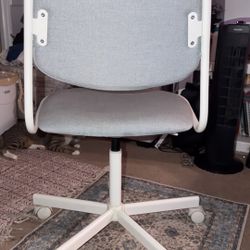 Grey And White Wheely Chair