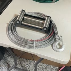 12000 lb winch cable and roller fairlead 65 feet x3/8” diameter brand new! Never installed