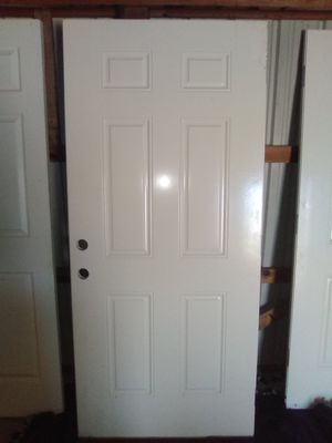Photo 3 wood edge steel door's and 4 indoor door's $75 obo on steel doors $50 obo on indoor door's or $300 obo for all