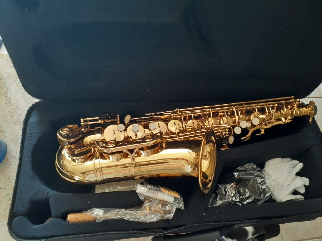 Brand New Alto Saxophone With Extras!