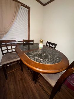 Dinner table with four chairs …$60