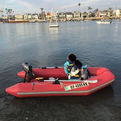 Boat and Outboard Motor (2 Stroke)
