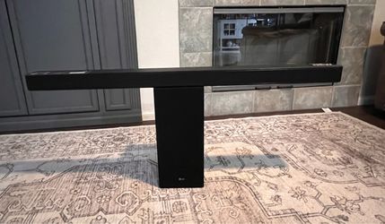 LG 42” sound bar system with a wireless subwoofer.