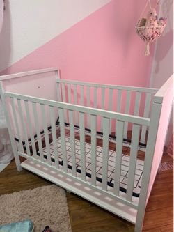 White standard baby crib