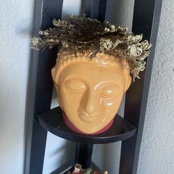 Buddha Head Planter with Rose Of Jarico Cms With It  