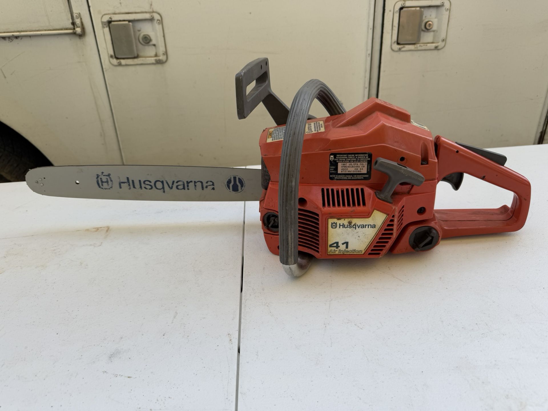 Husqvarna chainsaw. Tools