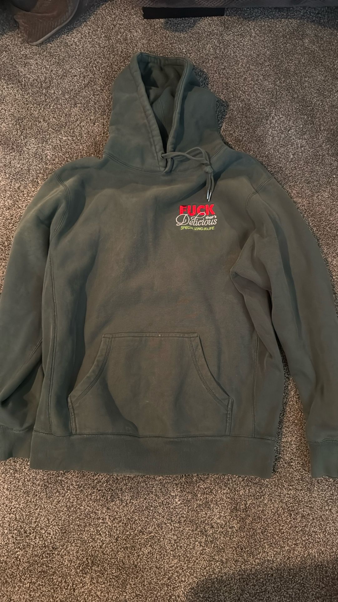 Action Bronson’s “Fuck, That’s Delicious” Hooded Sweater Merch Line
