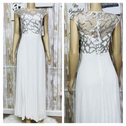 XS) Beautiful A-line dress with transparencies and sequin embroidery