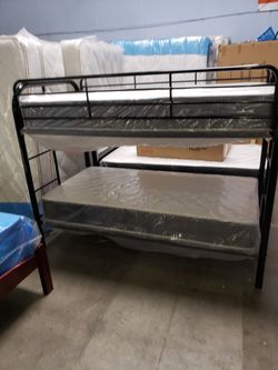 New twin bunkbeds with mattresses $325