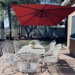 Antique Yard Table With 6 Wave Chairs  And Lager Size  Umbrella