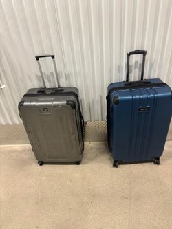 Two large 30” high Sharper Image and Kenneth Cole reaction..on wheels $50 each