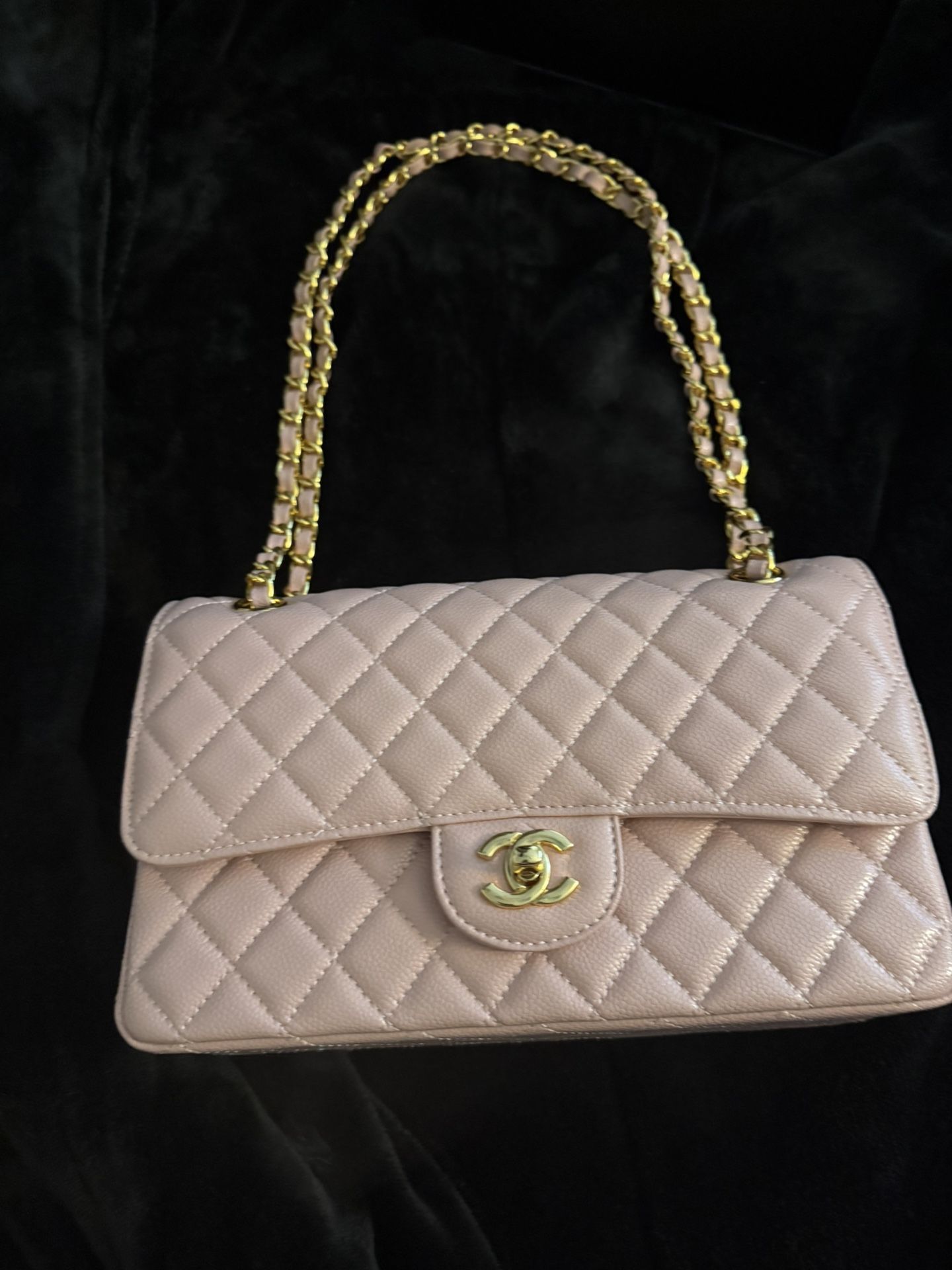Pink Chanel bag with gold hardware