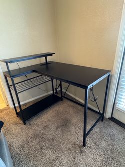 Gaming desk with led lights and power outlets