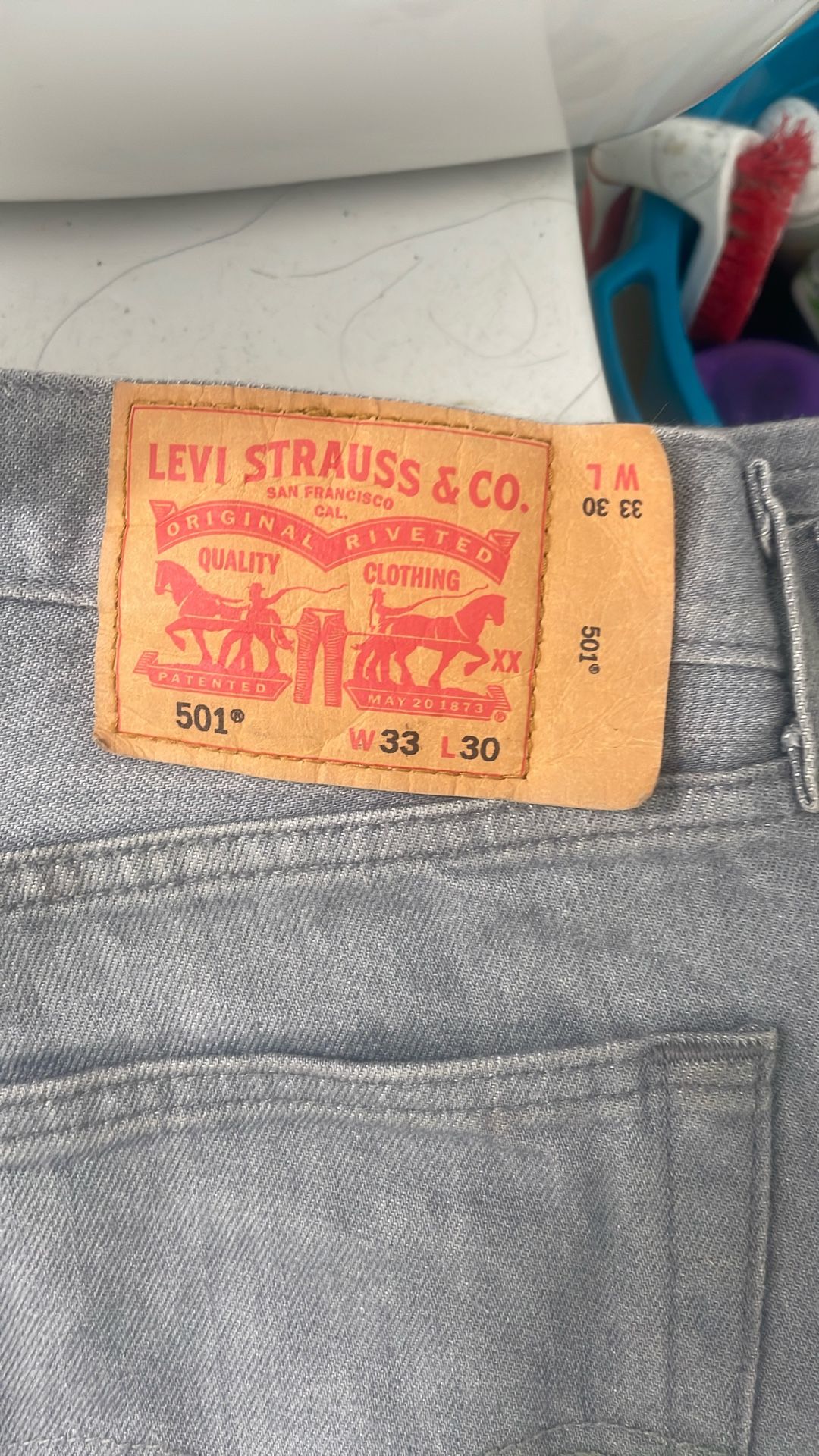 gray levi’s 501’s