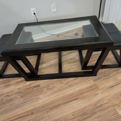 3-Piece Coffee Table. Dark Brown/Black Center Table With Glass Top, and Two Side Tables With Black Leather Top. 