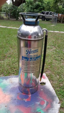 Old antique fire extinguisher make offer.
