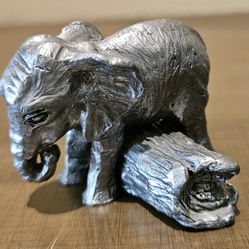 MINIATURE BABY ELEPHANT PEWTER FIGURINE CLIMBING OVER A LOG MADE IN THE USA