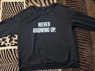 Never growing up pullover