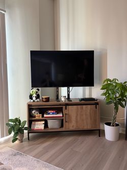 Rustic Wood TV Stand with Sliding Barn Door