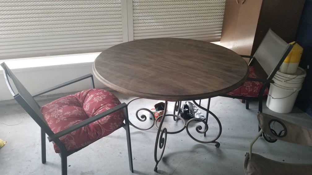 4 ft real wooden table with 2 chairs