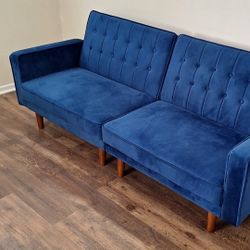 Blue Futon. In Great Shspe. Makes Into A Full Size Bed