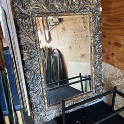 Ornate artist design golden solid wood  bevelled mirror 46 x 62.. $300