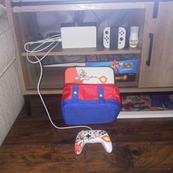 Nintendo switch Oled Bundle 6 Games+sd Card+extra Mario Controller+ 2 Travel cases In Like New Condition no Box