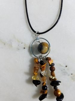 Black and yellow Iolite pendant