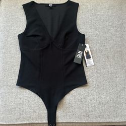 Black bodysuit with body hugging fabric