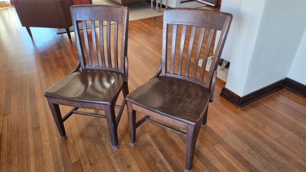 Solid wood dining chairs (2)