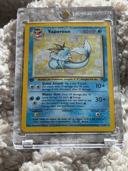 Vaporeon Holo Pokémon Card 12/64 1st Edition Jungle