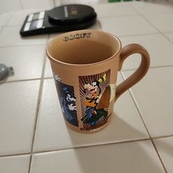 Walt Disney World Evolution of Goofy Scenes Brown Tan 12 oz Coffee Mug