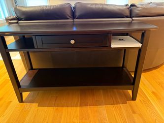 Jordan’s Furniture matching console table/TV stand