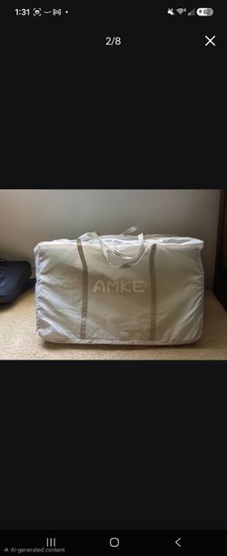 AMKE Bassinet with a Large Storage Carry Bag