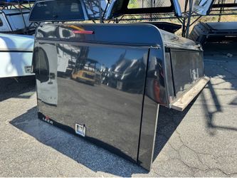 Chevy, tundra , ford commercial camper shell black