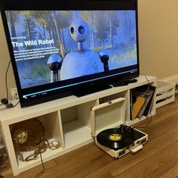 Sharp 52” TV with roku and white ikea stand and roku if you want