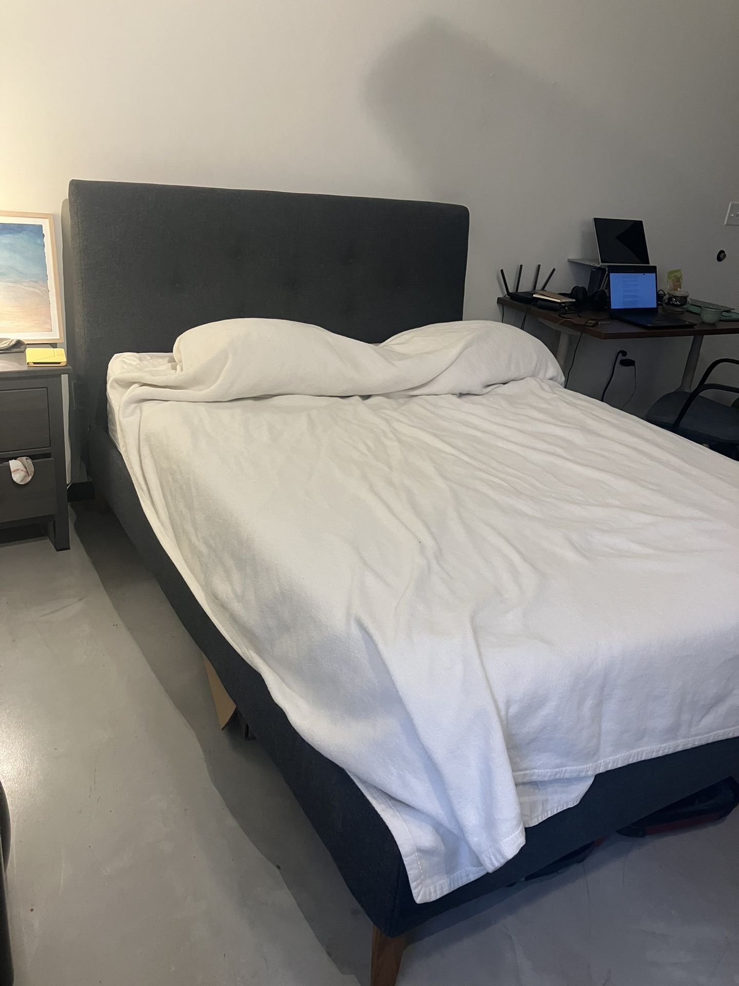 IKEA bed frame with padded headboard