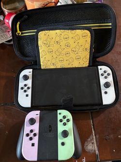 Nintendo Switch OLED with Extra Joy-Cons and Case