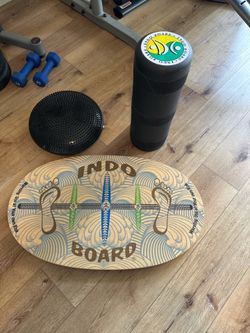 Indo board balance trainer