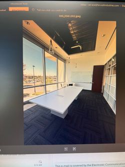 White conference table & reception desk must go today