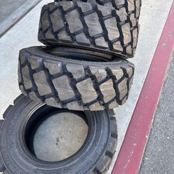 4 Bobcat tires 10-16.5 $1200